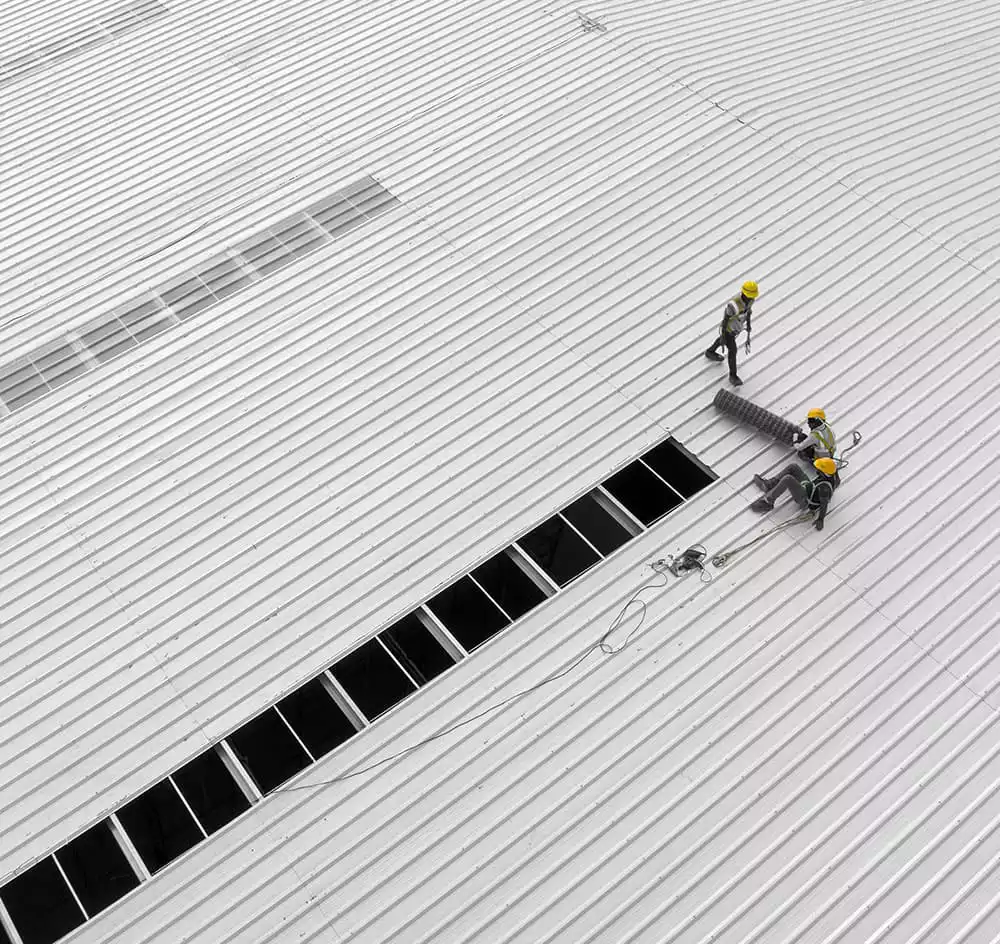 Workers working on a Industrial Peb Building