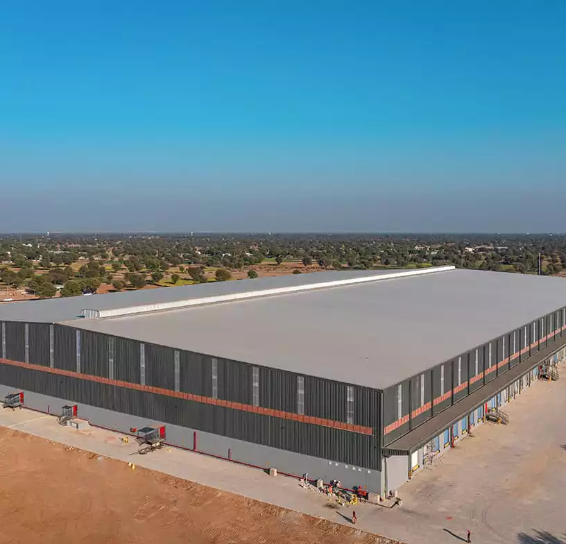 Everest Industries PEB warehouse building solution for Nahar Industrial Enterprises Ltd